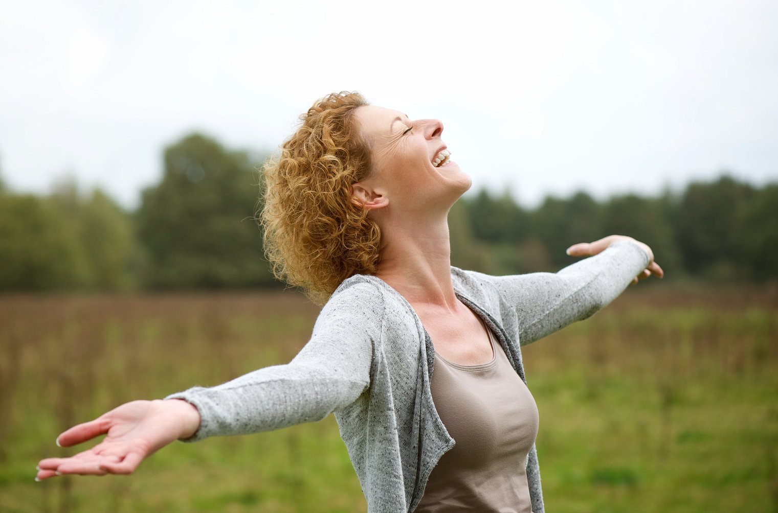 Happy Middle Aged Woman Enjoying Life